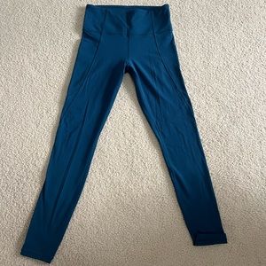 Athleta Stash Pocket Salutation Tight